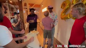 Slutty bottom Zacc Andrews has his cute face facialized in a bukkake birthday orgy