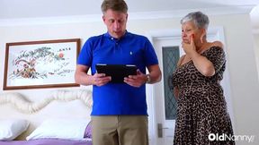 Mature Woman Seduces Young Realtor in Bedroom Encounter
