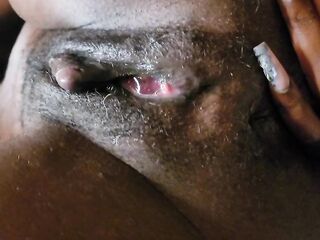Cum Trickling From Curly Black Cunt
