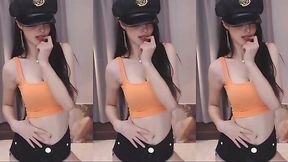 Chinese chick with big tits flaunts sexy dance moves