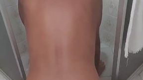 Ladysilva naked in the bathroom with a plug in her tanned, sexy ass.