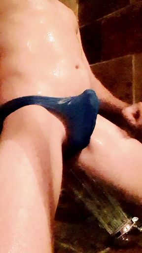 Blue swimsuit wet and soapy