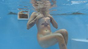 Hottest Babe Mimi Cica shows off her 18 year old tight pussy and big tits underwater
