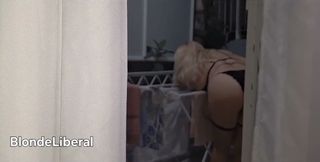 A Shameless Housewife Showing off to Passersby on the Street While Her Husband Is at Work