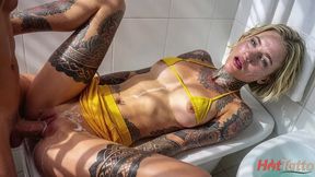 i was peeping at my friend s tattoos in the bathroom and she didn t mind me walking in on her. [ai]