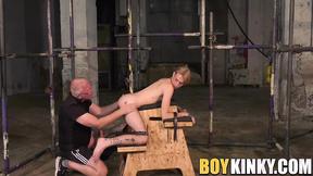 ”Mature master Sebastian Kane stretches his twink slaves butt”