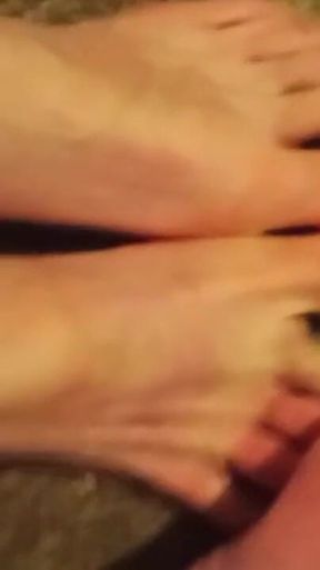 Rubbing and Playing with My Toes