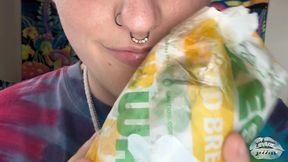 Close Up Messy Eating A Sandwich
