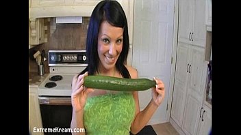 Kream fucking her holes with her vegetables until she squirts