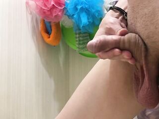 I pee in the bathtub with an uncut jock with large balls