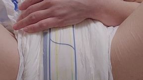 Wetting diaper and showing inside