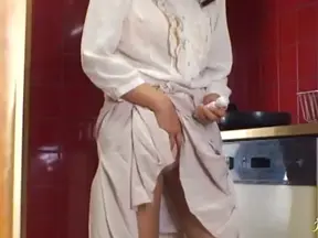 Seductive Mature Japanese Woman Spices Up Kitchen Encounter