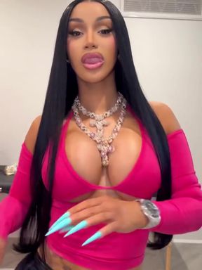 Female Onlyfans Model in Pink Shirt and Long Nails