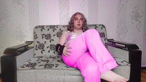 Stunning femboy leaning against door with flirty smile