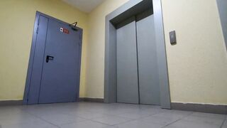 Blonde Russian Girl Twirls a Hoop Naked in Public by an Elevator