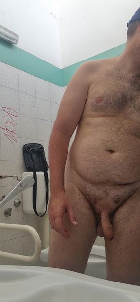 Completely Naked in a Station Bathroom