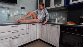 Sexy GILF Iris in the Kitchen Teasing in Nude Pantyhose