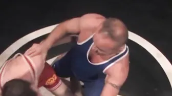 Hairy wrestlers Taurus and Julien Arnaud fist and fuck on the mat