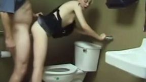 My buddy drilling a blonde whore's cunt in the toilet