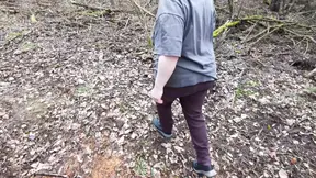 Barefoot babe slaps big tits in nature