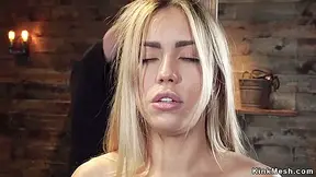 Blonde In Upside Down Bondage Position