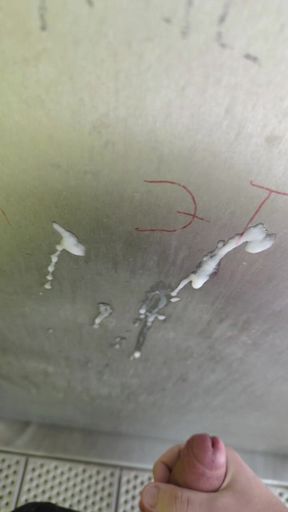 Cumshot on public highway restroom door