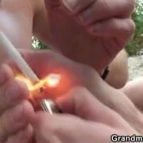 She takes two horny dicks outdoor