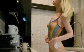 Hot blonde raves in fishnet body suit, flashes her tight pussy