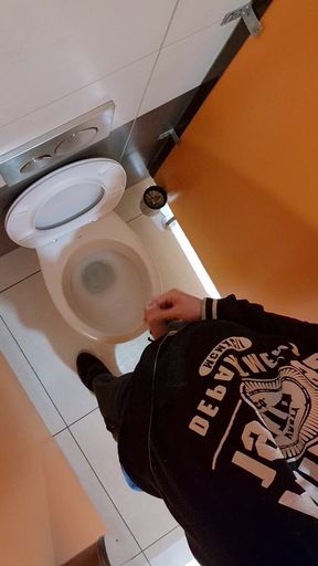 Pissing in a common toilet during work