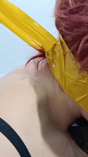 Tied with Plastic Tape Gagged with a Heel on the Face and Being Masturbated with a Toy