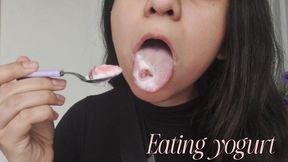 Slow and sensually eating yogurt