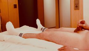 Guy in Adidas tennis socks masturbates until he cums