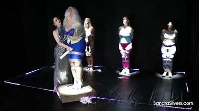 Chubby contestant faces femdom discipline on a kinky gameshow stage