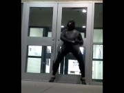 lubed rubber man cums in front of doors