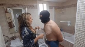 Domestic slave cleaning the bathroom for Dominatrix Ghalia