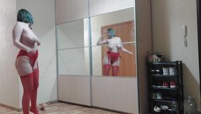 I undress in front of the mirror, and then masturbate and squirt