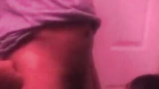 Black milf giving blowjob at a party