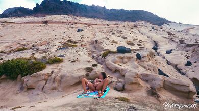 Shameless MILF on vacation masturbates on a public beach then gets fucked by a stranger