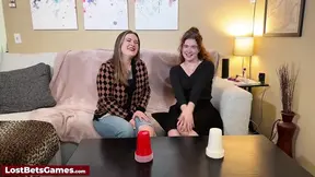 Busty lesbians play strip cup game