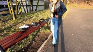 She pee through pants and flashing in a public park