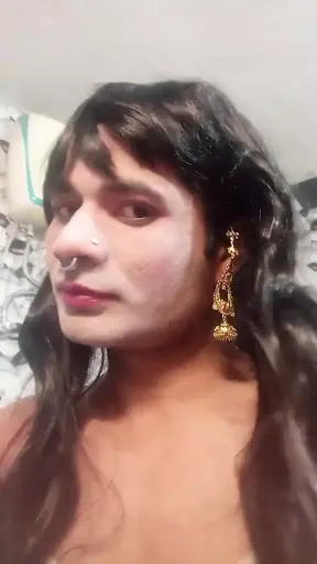 Beautiful transgender drinking 2 glasses of urine