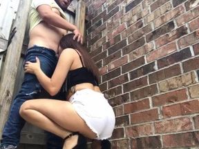 Slutty Teen Gives a Blowjob in Public
