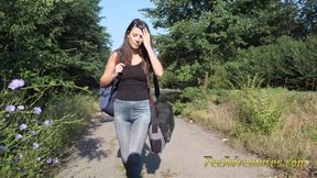 Waiting on the street for her boyfriend with her bladder full