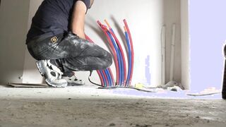 Deviant plumber gets wild while hes working on radiator fucking in construction