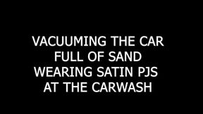Vacuuming the car full of sand wearing satin pjs at the car wash