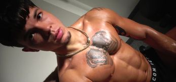 Sexy Muscle Boy Shows Off His Toned Abs and Body