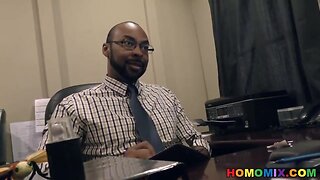 Ebony doctor removing something from the butt of a white guy
