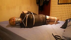 And Tightly Gagged On The Bed