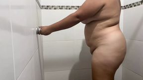 I catch my big tits stepmom getting in the shower and she starts caressing her breasts and vagina very nice while using soap.