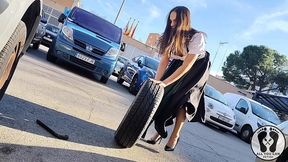 dirndl slut gets dirty and oily changing tires